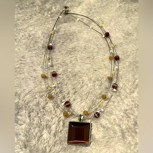 Necklace. Beautiful with beads and a square charm. 15”, adjustable to 17 3/4”